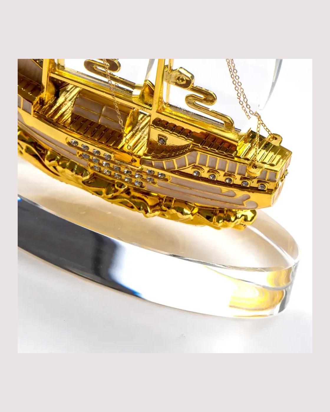 Becece - Golden Boat Shaped Memento in Metal with Glass Base in Luxury Box